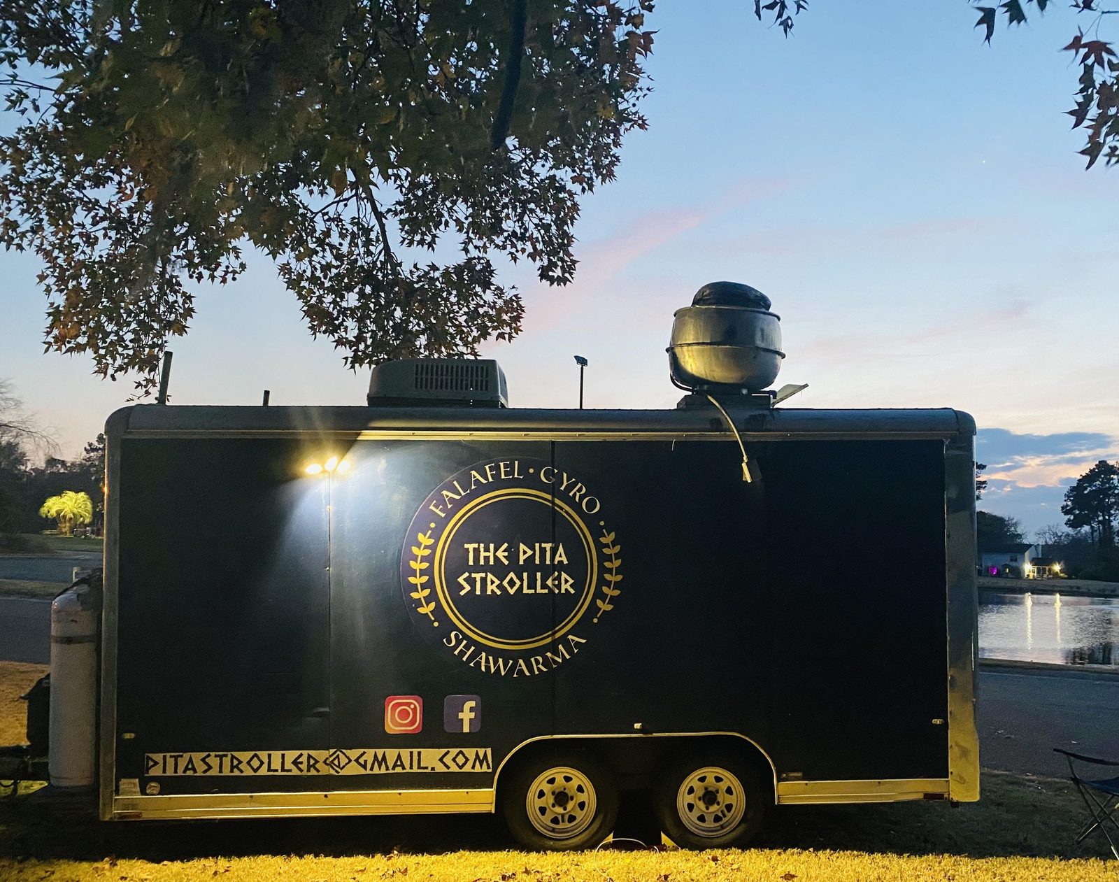 The Pita Stroller trailer serving at an evening event
